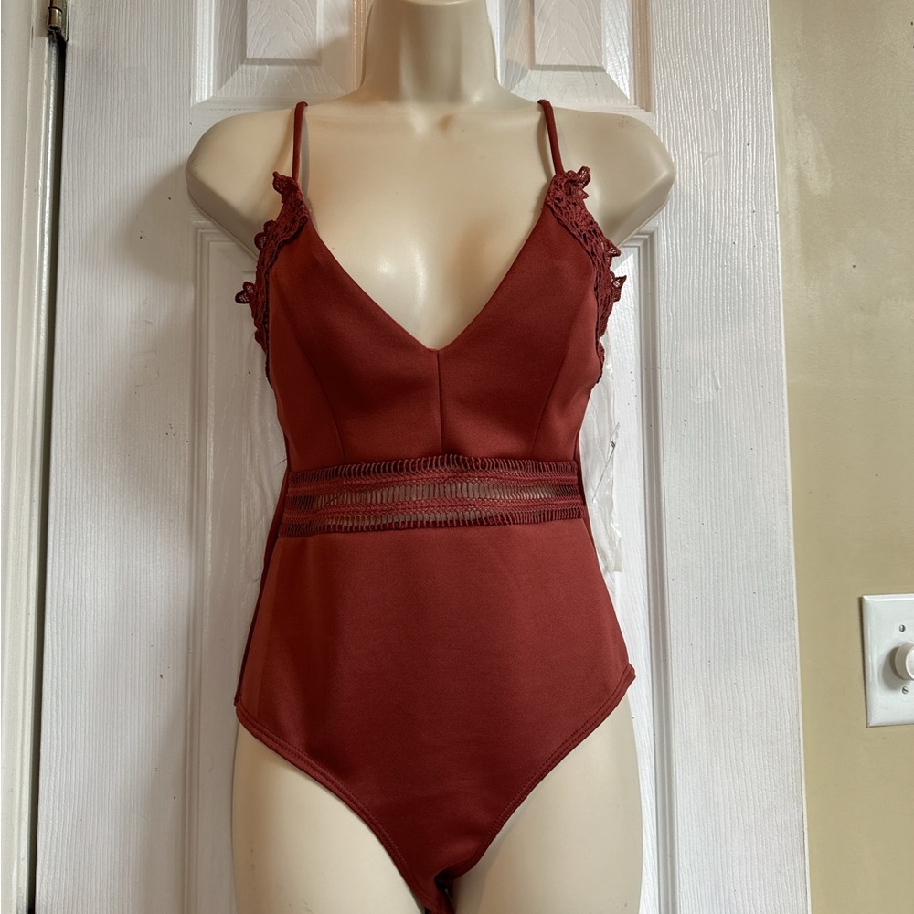 NWT Charlotte Russe Bodysuit Small rust color
